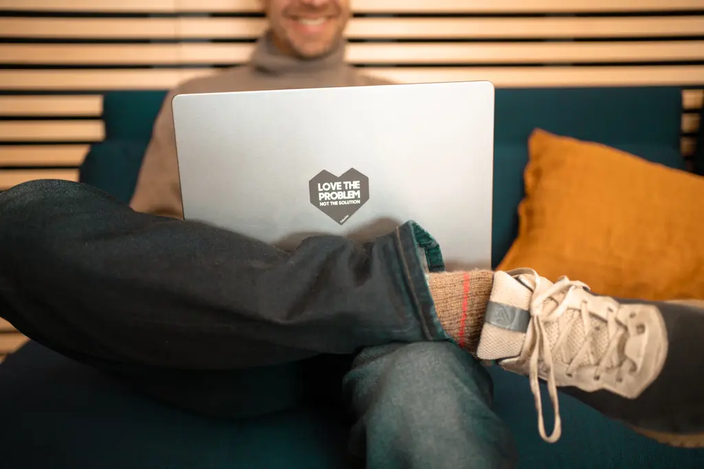 A Futurice team member working on a laptop